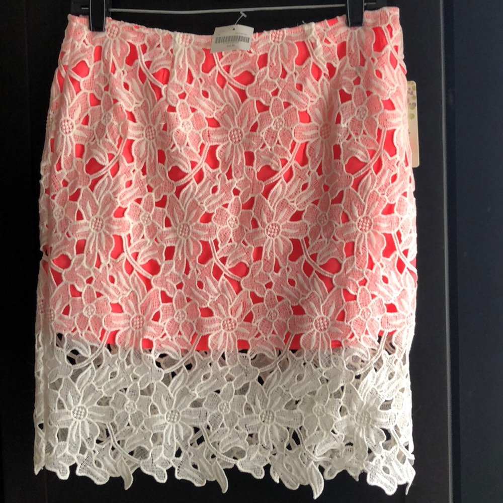 Coral and white lace skirt.